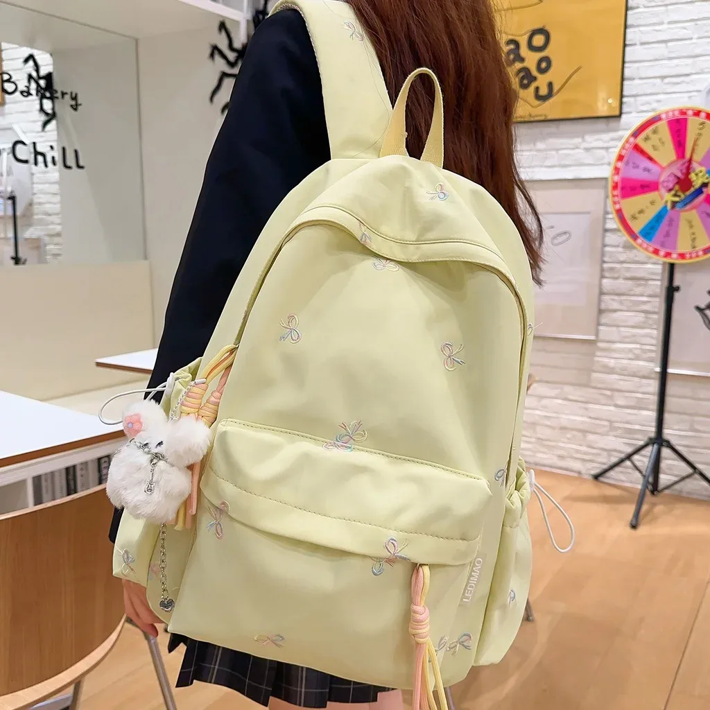 sac à dos pour adolescentes, confortable, brodé, décontracté, sac d'école pour le lycée et l'université, sac à dos scolaire tendance en nylon pour tous les jours.
