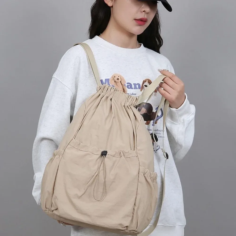sac à dos de voyage décontracté de couleur unie, léger, de style coréen, avec cordon de serrage, grande capacité, pliable, cartable de sport pour étudiants