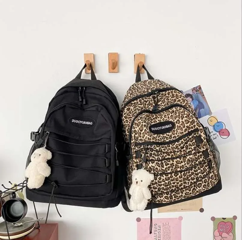 sac à dos de voyage imprimé léopard pour hommes et femmes, style européen, grande capacité, toile étanche, décontracté, double fermeture éclair, sacs à bandoulière, sac d'école
