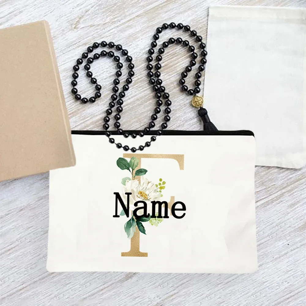 pochette en toile personnalisée avec initiales florales dorées, trousse de toilette légère personnalisée avec monogramme pour femmes, idéale pour les voyages quotidiens.