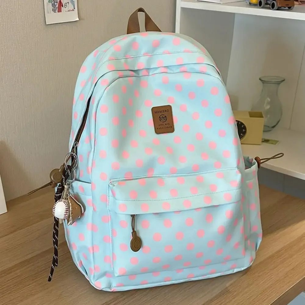 Sac à dos à pois multicolore, minimaliste, avec bordure en dentelle, plusieurs poches, design à nœud, sac d'école pour étudiants, idéal pour les voyages.