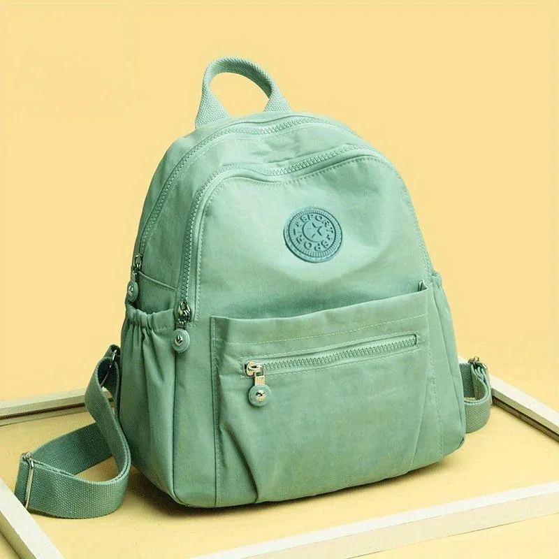 sac à dos en nylon de couleur unie, sac d'école de voyage léger, sac à dos de mode pour le travail, sac de voyage peut être accroché dans les bagages
