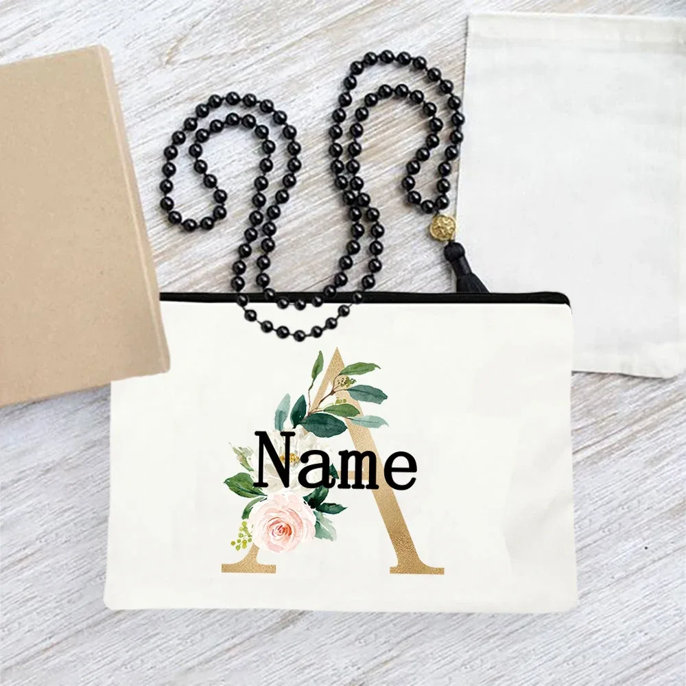 pochette en toile personnalisée avec initiales florales dorées, trousse de toilette légère personnalisée avec monogramme pour femmes, idéale pour les voyages quotidiens.