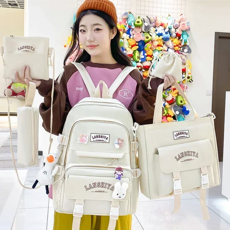 Forêt japonais coréen Harajuku étudiant sac à dos lycée femme grande capacité mode loisirs voyage nouveau Style pendentif gratuit