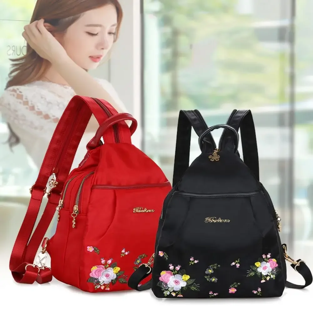 Mode broderie sac décontracté imperméable Oxford femmes sac à dos femme grande capacité voyage sac à main Shopping boutons-pression sac à bandoulière