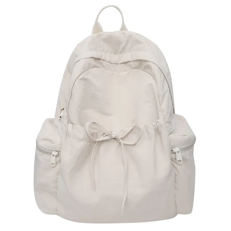 nouveau sac à dos mignon de couleur unie pour femmes, sac à dos de loisirs en nylon pour étudiantes, cartable pour adolescentes, sac à dos de voyage à la mode