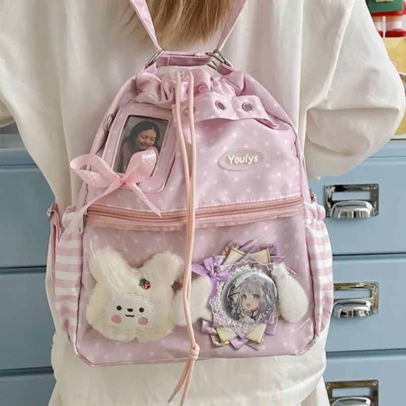 Sac à dos Ita mignon à pois avec cordon de serrage et poche transparente pour pince, sac multifonctionnel pour l'école, les trajets et les sorties