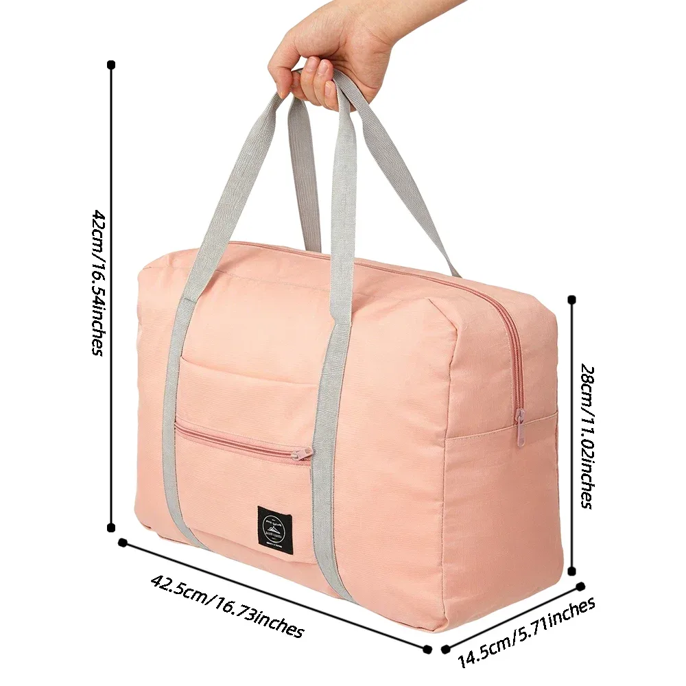 sac de voyage pliable de grande capacité, imperméable et résistant à l'usure, peut être porté à la main et stocké sur une épaule à la maison.