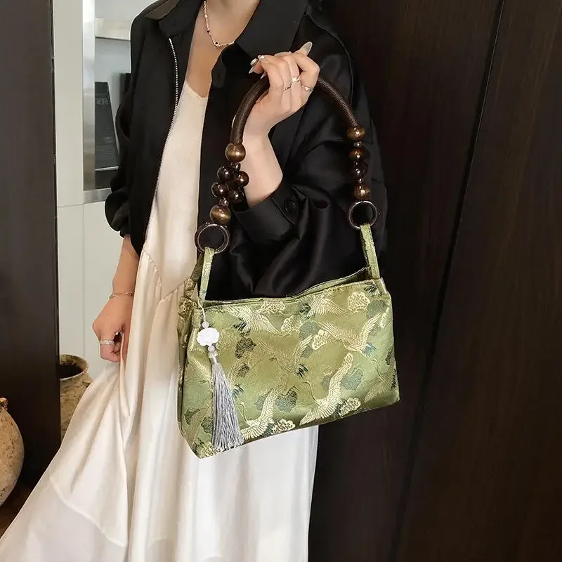 hasp fil à coudre brodé style national sacs à bandoulière gland décoration 2025 printemps nouvelle offre spéciale sacs à main pour femmes