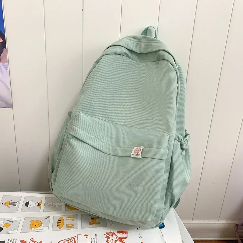 nouveau sac à dos imperméable en nylon pour femmes sac de voyage pour femmes sacs à dos cartable pour adolescentes couleur unie bookbag mochila bookbag