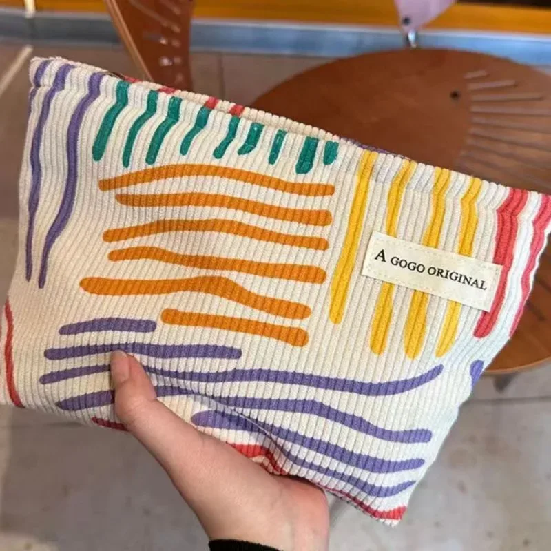 trousse de toilette en velours côtelé, sac de rangement portable rayé pour produits de soin, essentiels de voyage pour étudiants et déplacements professionnels