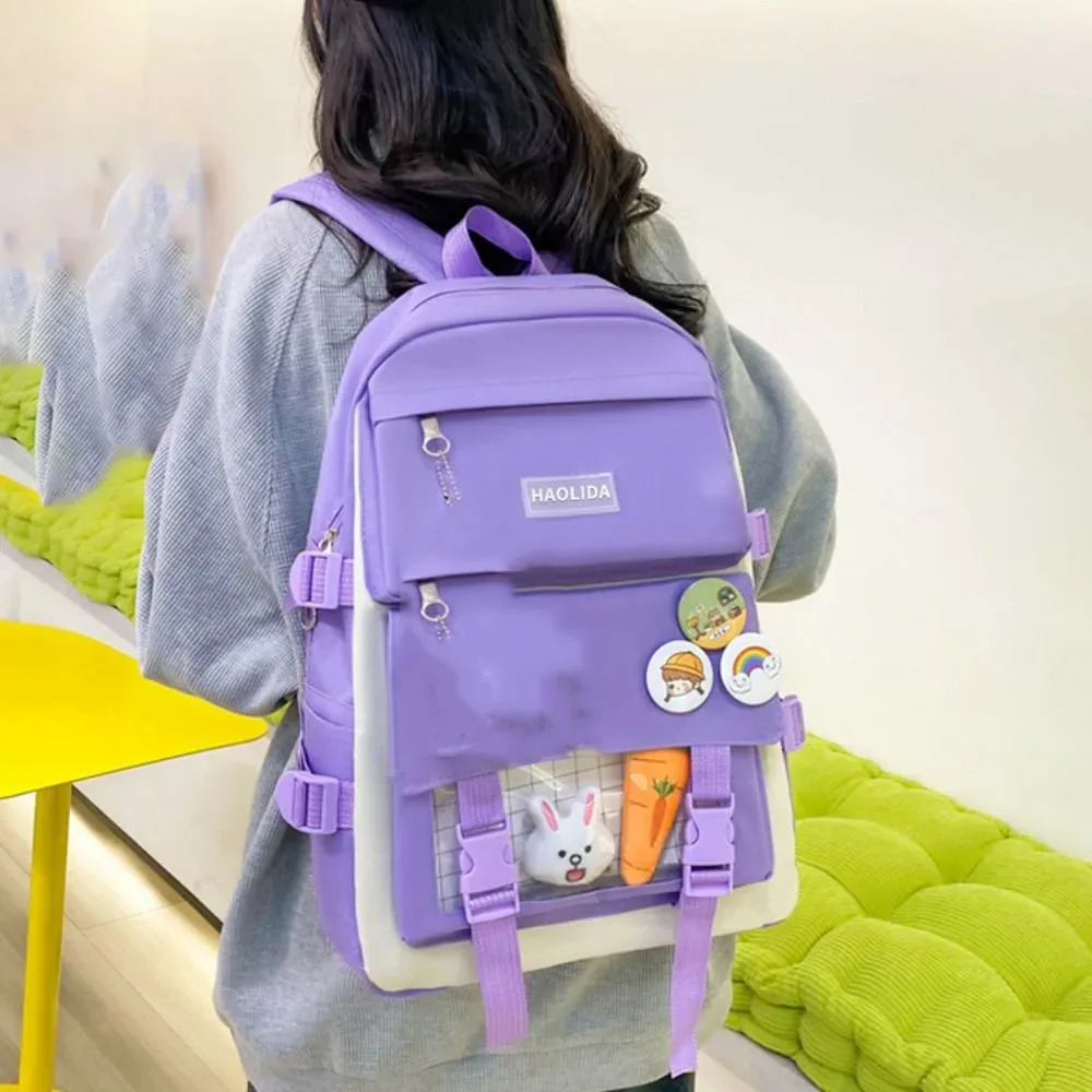 sacs décontractés en nylon de grande capacité, sac à dos à bandoulière avec badge de trajet simple, un ensemble de quatre cartables, sac d'école de style coréen pour enfants
