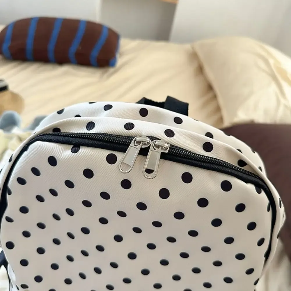 sac à dos mignon et adorable à pois, minimaliste, avec plusieurs poches et un nœud, léger et durable, idéal pour les étudiants et l'utilisation en extérieur.