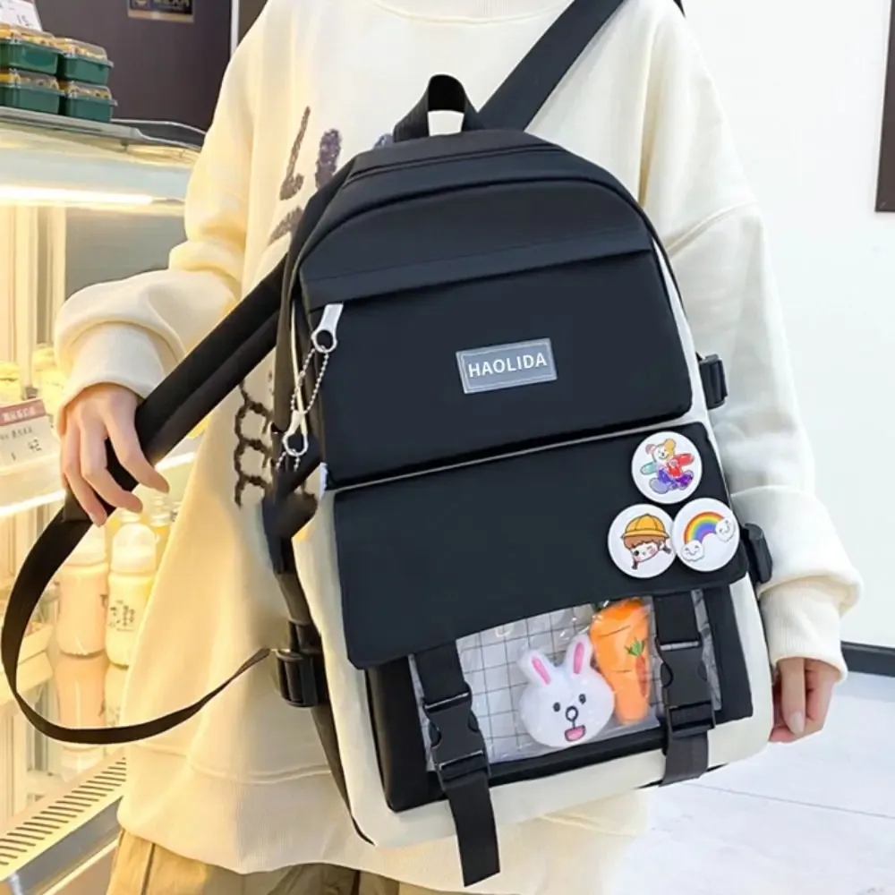sacs décontractés en nylon de grande capacité, sac à dos à bandoulière avec badge de trajet simple, un ensemble de quatre cartables, sac d'école de style coréen pour enfants