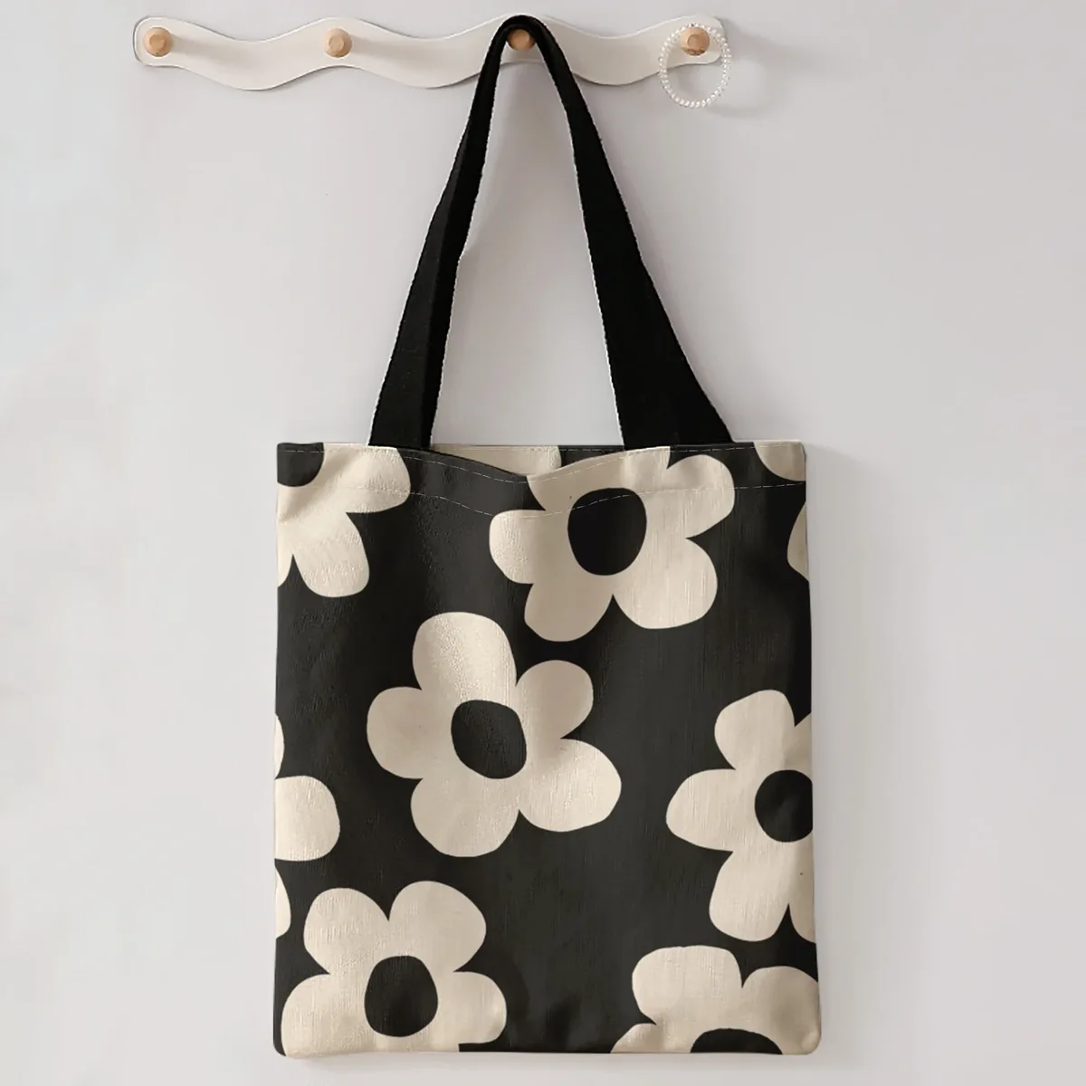 sac fourre-tout à imprimé floral simple beige sur fond noir, sac à bandoulière de grande capacité pour le shopping, les voyages et l'usage quotidien