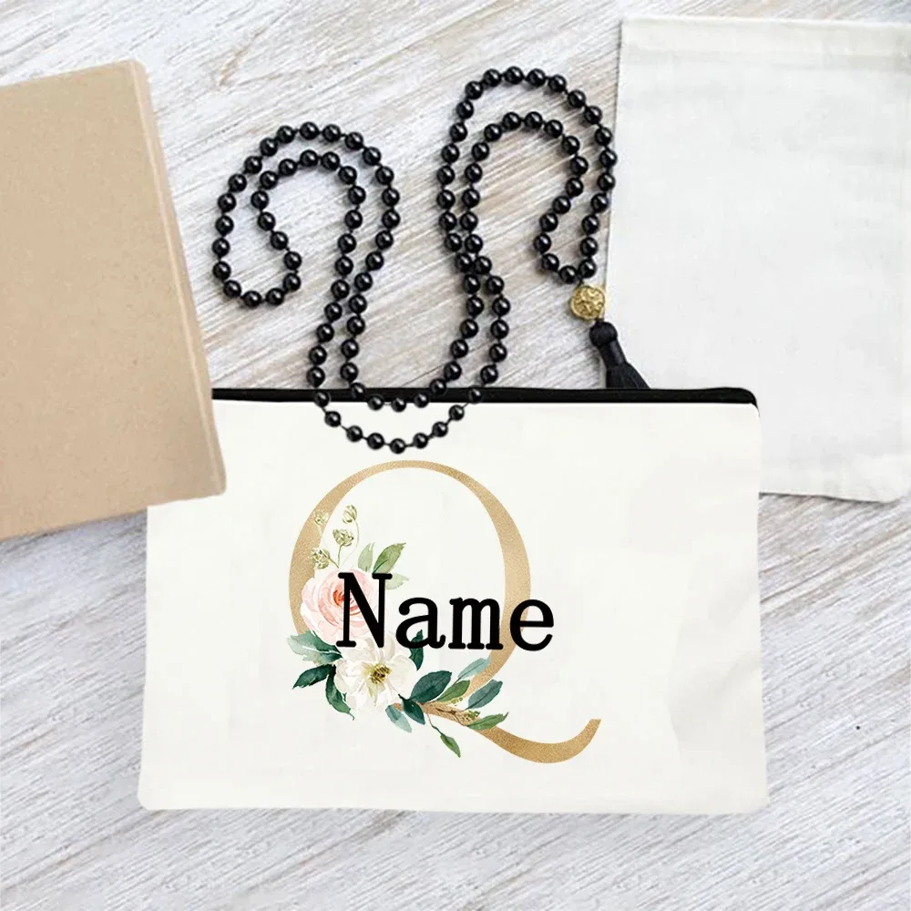 pochette en toile personnalisée avec initiales florales dorées, trousse de toilette légère personnalisée avec monogramme pour femmes, idéale pour les voyages quotidiens.