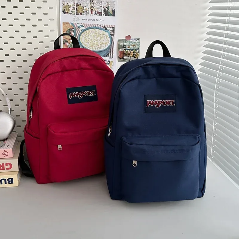 nouveau sac à dos grande capacité unisexe, couleur unie simple, pour le campus et les voyages, haute valeur esthétique, sac à dos à double bretelle pour hommes et femmes
