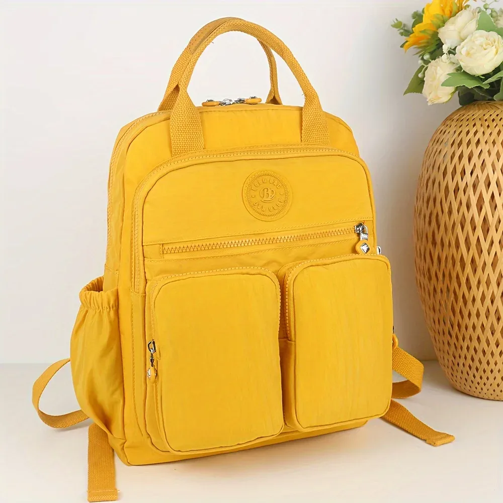 sac à dos d'école léger de grande capacité, sac de voyage multi-poches, matériau en nylon résistant à l'usure, bretelles confortables.