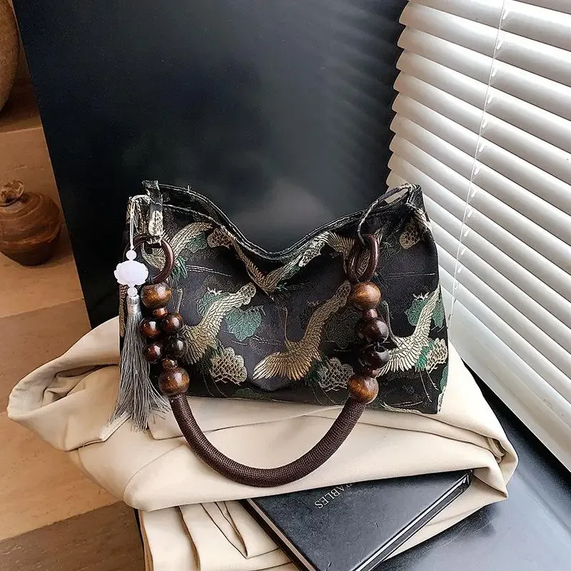 hasp fil à coudre brodé style national sacs à bandoulière gland décoration 2025 printemps nouvelle offre spéciale sacs à main pour femmes