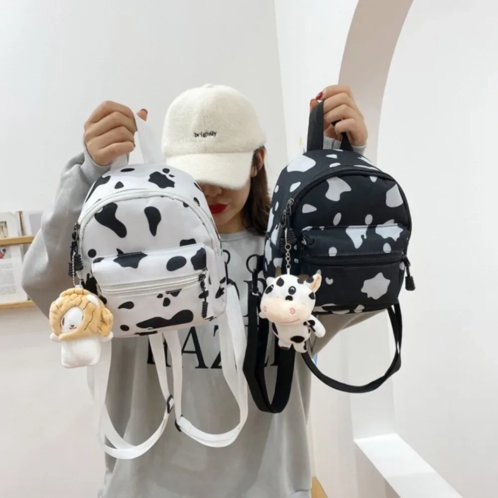 Sac à dos mini multifonctionnel en toile pour femme, motif vache mignon, avec bandoulière réglable, idéal pour les voyages