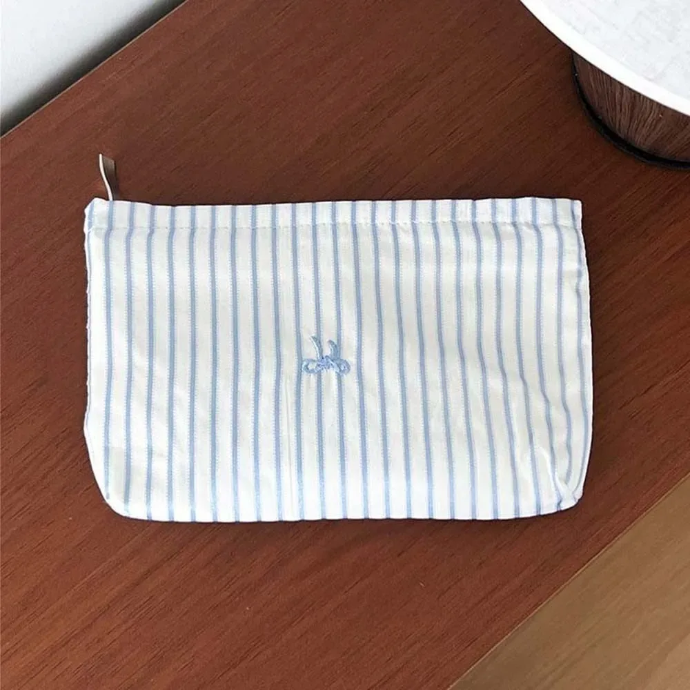 pochette à maquillage classique à rayures, motif brodé, fermeture éclair lisse, organiseur de cosmétiques, couleurs pastel, taille compacte, trousse de toilette