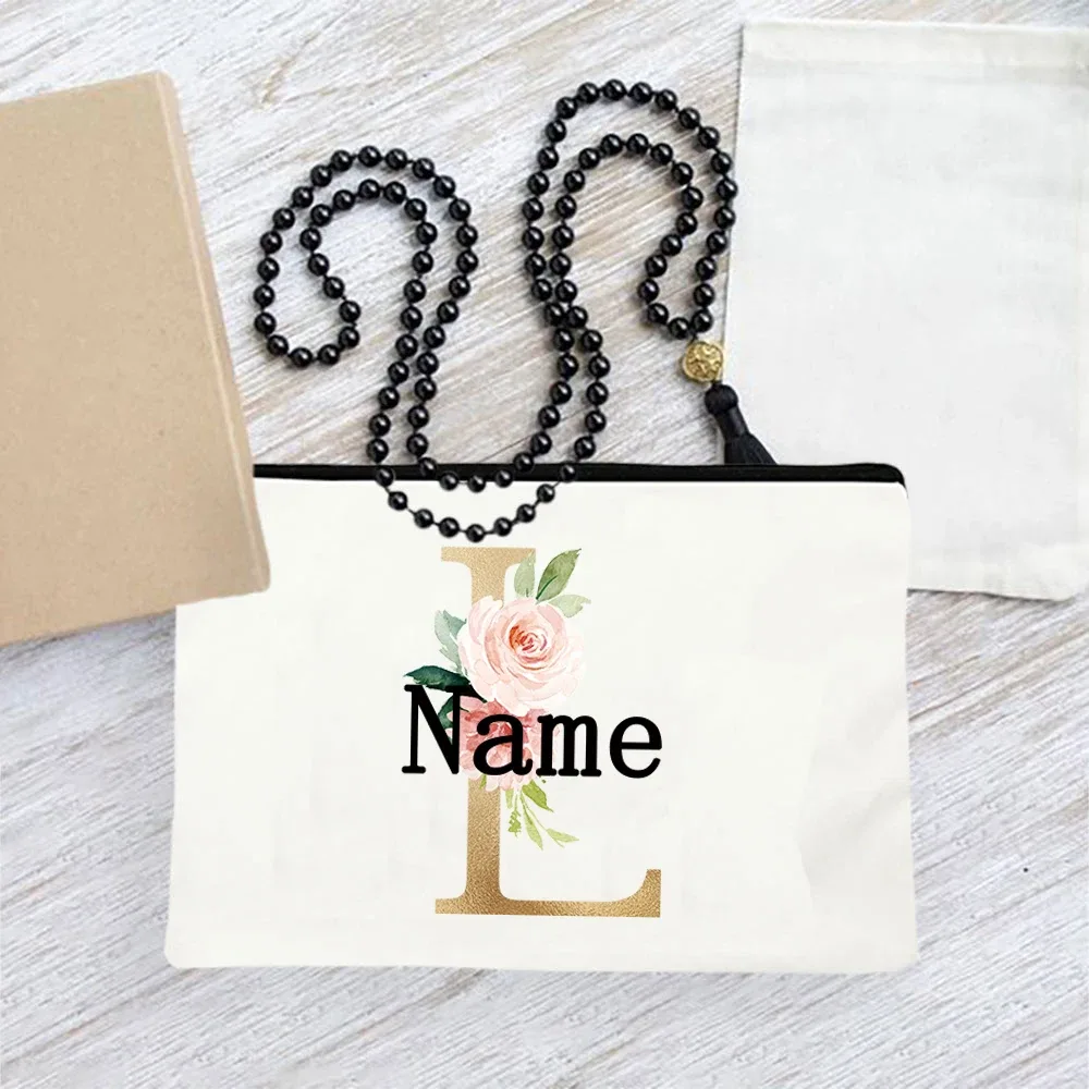 pochette en toile personnalisée avec initiales florales dorées, trousse de toilette légère personnalisée avec monogramme pour femmes, idéale pour les voyages quotidiens.