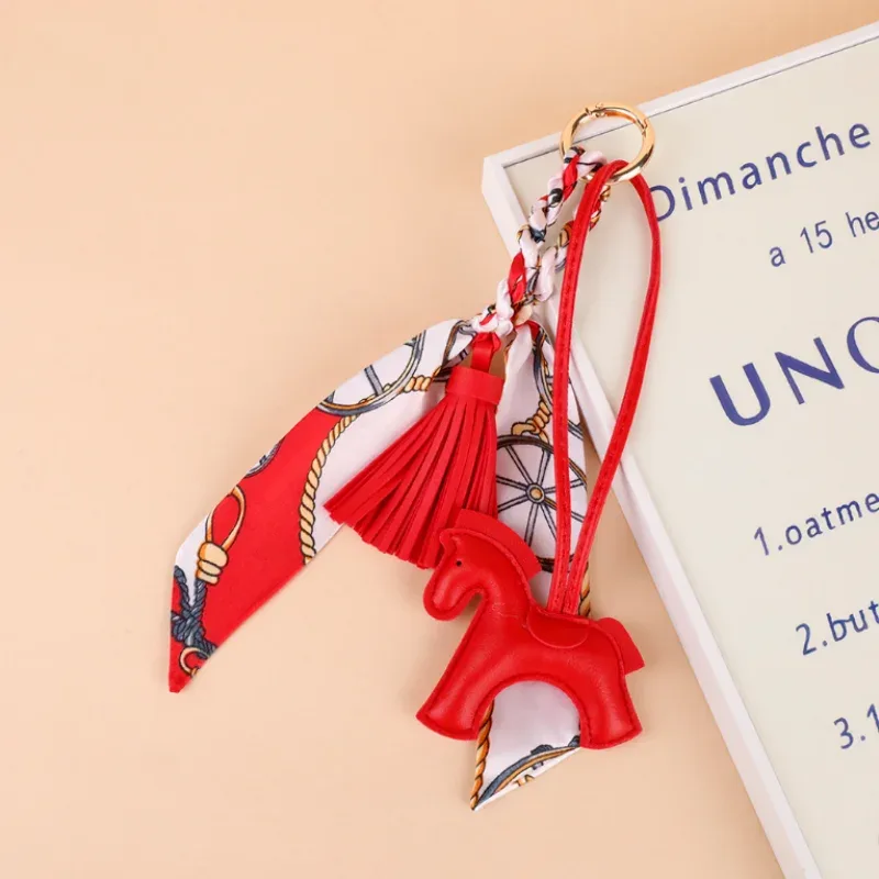 1 pièce porte-clés poney en cuir avec cordon tressé, pendentif pour sac à dos, accessoires de suspension pour sac de téléphone, décoration diy
