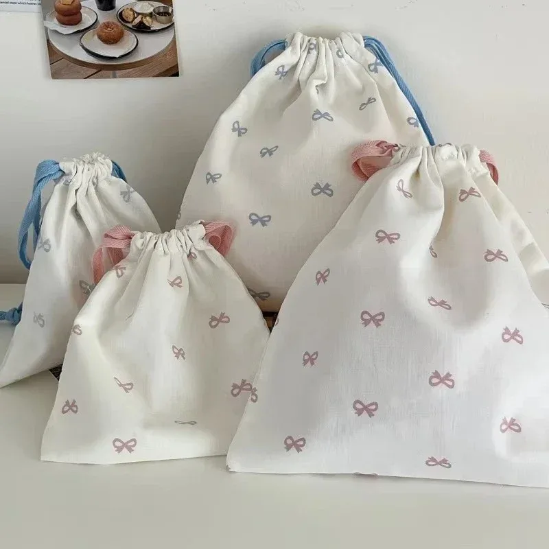 sac de rangement coréen à cordon imprimé avec nœud mignon, sac à cosmétiques portable pour filles, organisateur de maquillage de voyage pour femmes, pochette à main