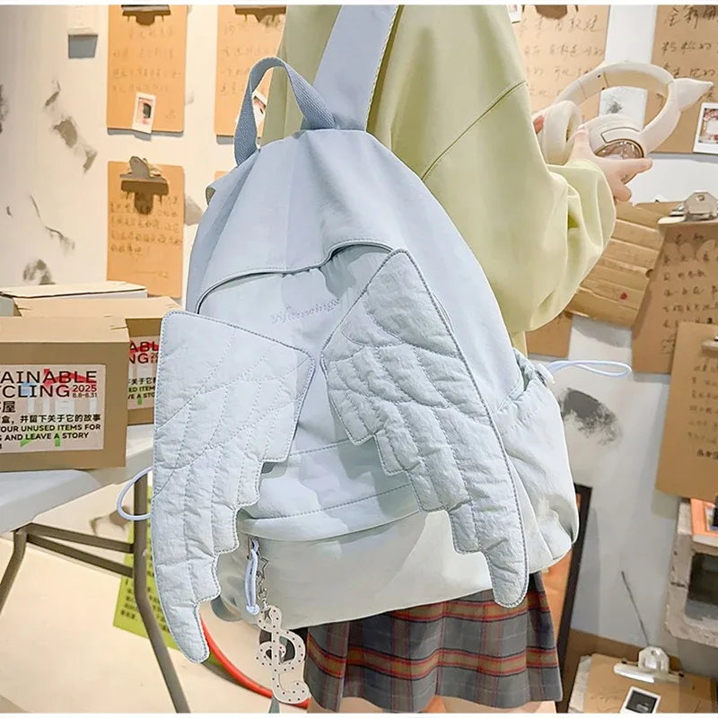 sac à dos matelassé ailes d'ange mignon, sac d'école en nylon à la mode, motif brodé élégant, sac à dos décontracté, sac de voyage quotidien spacieux