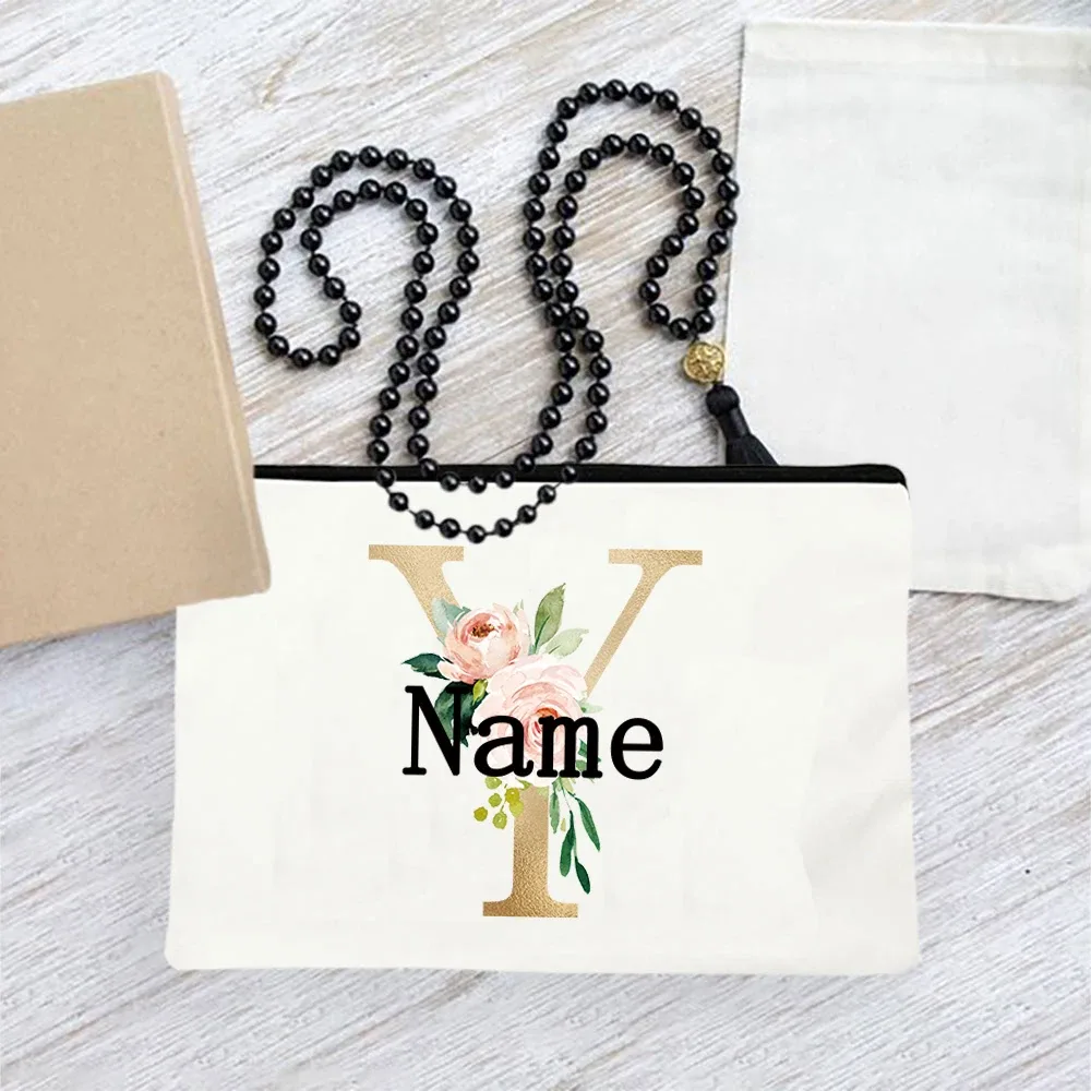pochette en toile personnalisée avec initiales florales dorées, trousse de toilette légère personnalisée avec monogramme pour femmes, idéale pour les voyages quotidiens.