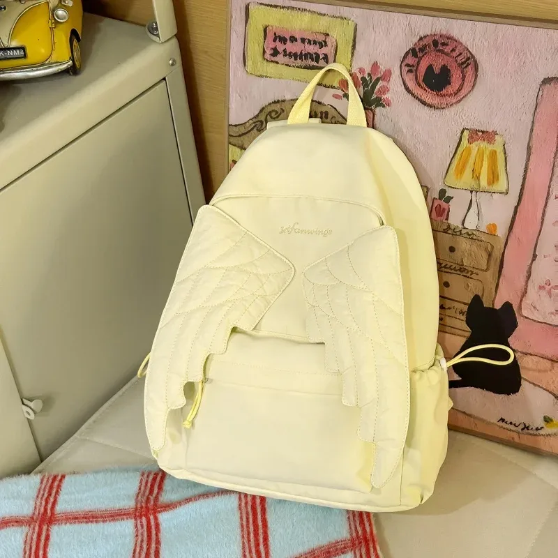 sac à dos matelassé ailes d'ange mignon, sac d'école en nylon à la mode, motif brodé élégant, sac à dos décontracté, sac de voyage quotidien spacieux