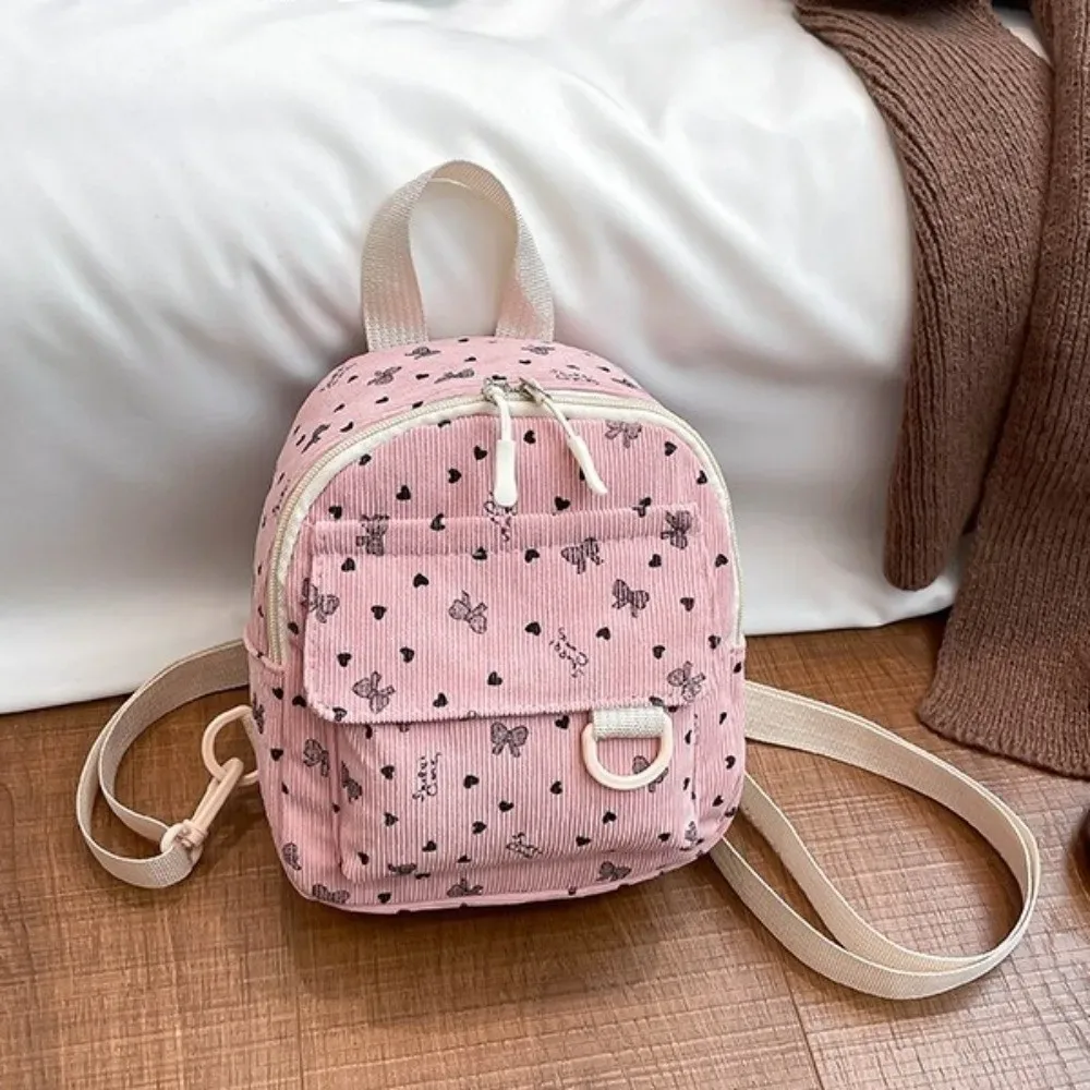 mini sac à dos en velours côtelé imprimé cœurs et nœuds, léger, décontracté, multi-compartiments, ouverture zippée, sac à bandoulière pour les trajets quotidiens