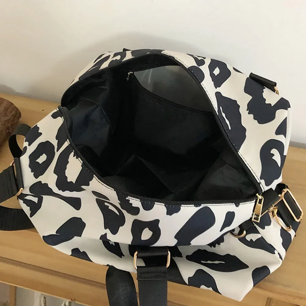 sac de voyage imprimé léopard pour femme, sac de week-end avec manche pour bagage, résistant à l'eau, sac de transport pour la nuit avec plusieurs poches