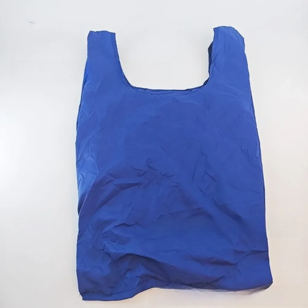 Sac de courses pliable en nylon portable, sac fourre-tout réutilisable en nylon durable, mécanisme de pliage, matériau imperméable, sac écologique ultra-léger