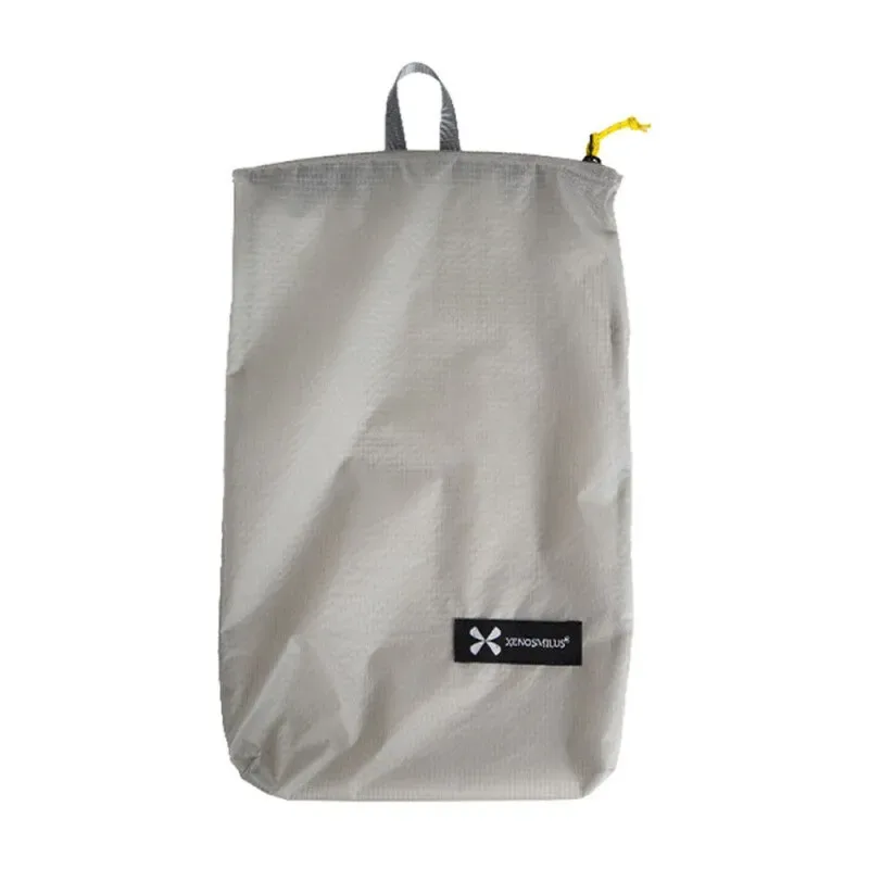 XENOSMILUS Sac à dos de voyage portable ultra-léger avec trousse de toilette étanche, portefeuille pour passeport, pochette pour médicaments et documents