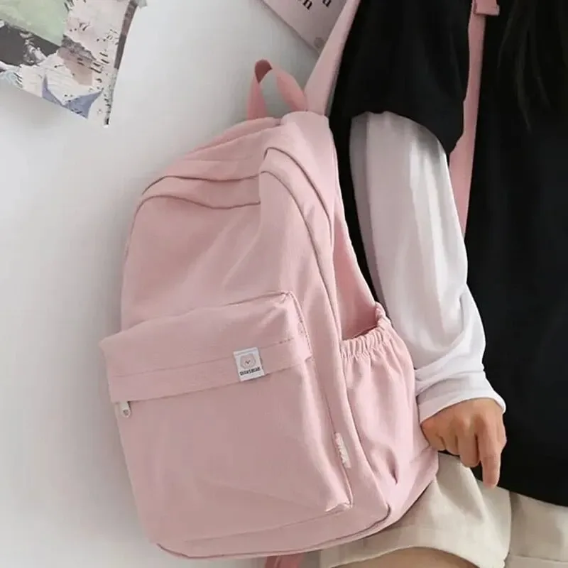 nouveau sac à dos imperméable en nylon pour femmes sac de voyage pour femmes sacs à dos cartable pour adolescentes couleur unie bookbag mochila bookbag