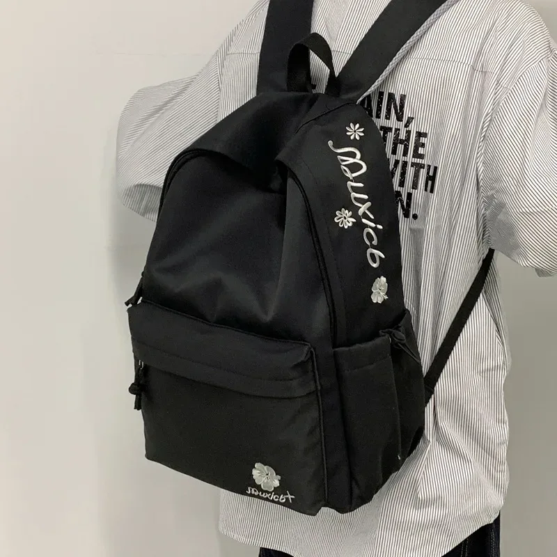 sac à dos noir minimaliste pour femmes, sac d'école décontracté avec broderie florale pour étudiants, utilisation quotidienne, voyage