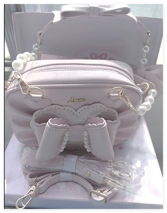 Nouvelle mode estivale japonaise : Sac à bandoulière oblique Lolita vintage, sac à dos mignon en PU avec nœud, perles et motifs d'amour pour femmes