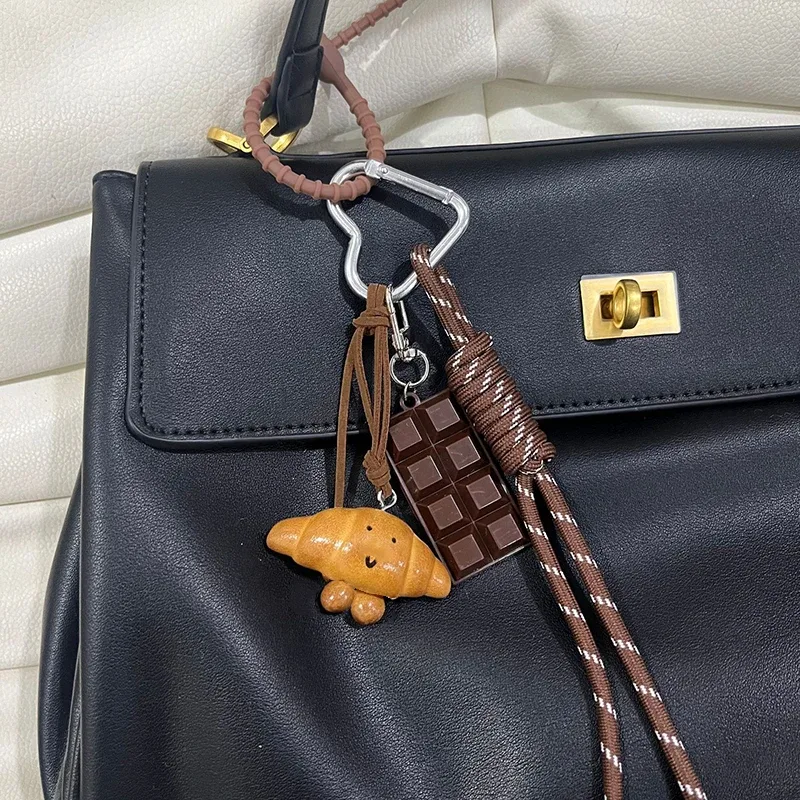 porte-clés mignon pain voiture sac à dos pendentif décoration nylon tissé adapté aux étudiants, couples, crochets pour clés