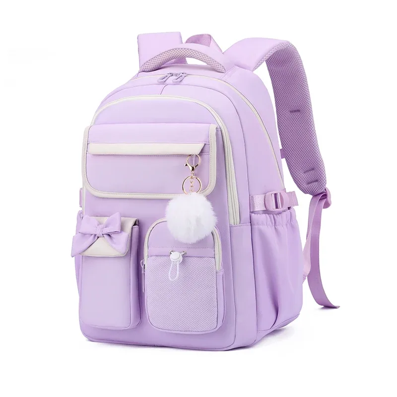 nouveau sac à dos scolaire en nylon grande capacité 2026 pour filles, sac à dos tendance avec nœud et couleurs bonbon, sac à livres pour adolescentes, sac à dos de voyage