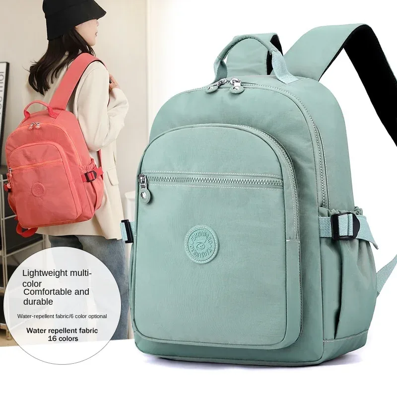 nouveau sac à dos de voyage pour femmes sac d'école en tissu nylon décontracté léger grande capacité à la mode double sacs à bandoulière en vente