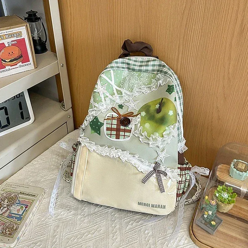 sac à dos kawaii à imprimé pomme et dentelle à volants pour femme, sac d'école à carreaux, sac à dos décontracté lolita pour étudiante, idéal pour les voyages quotidiens