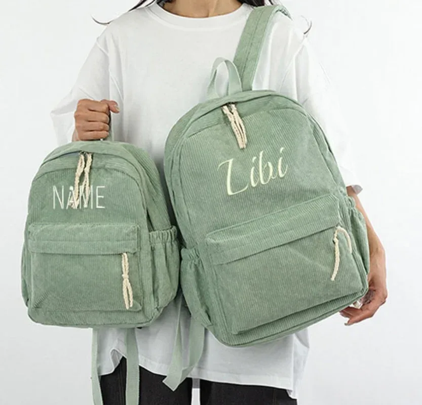 Cartable personnalisé 2025 nouvelle mode velours côtelé fermeture éclair lisse nom Unique personnalisé grande capacité sac à dos de voyage sac à dos de randonnée