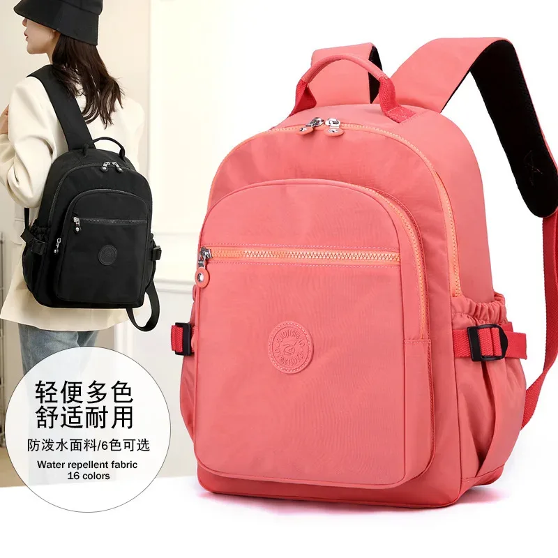 nouveau sac à dos de voyage pour femmes sac d'école en tissu nylon décontracté léger grande capacité à la mode double sacs à bandoulière en vente