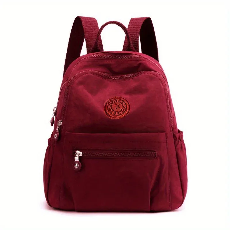 sac à dos en nylon de couleur unie, sac d'école de voyage léger, sac à dos de mode pour le travail, sac de voyage peut être accroché dans les bagages