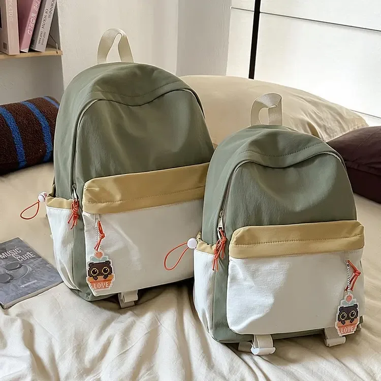 nouveau sac à dos de style japonais esthétique, léger, grande capacité, bicolore, pour jeunes.
