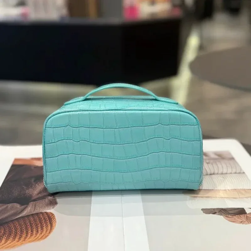 nouvelle trousse de maquillage en cuir véritable, motif crocodile, grande capacité, série de couleurs haut de gamme, sac de toilette portable de voyage
