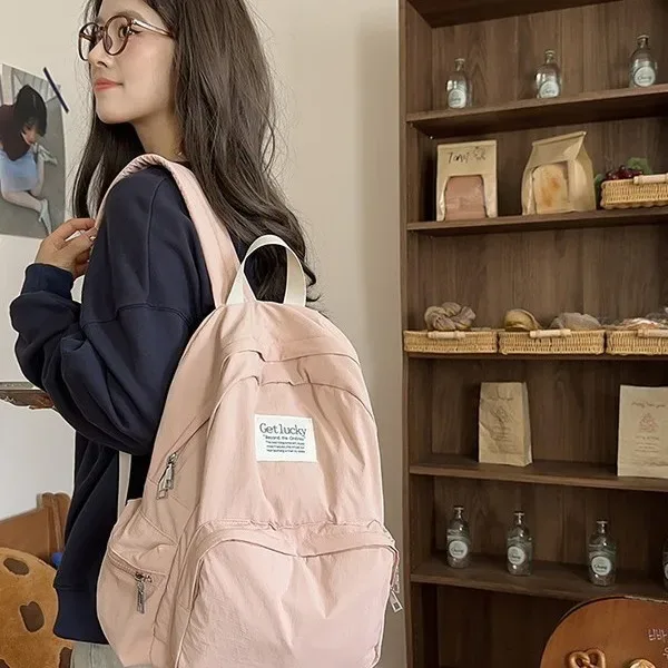 nouveau sac à dos de voyage décontracté pour femme 2025 – léger, grande capacité, imperméable en nylon, double bretelle, style frais et doux 14
