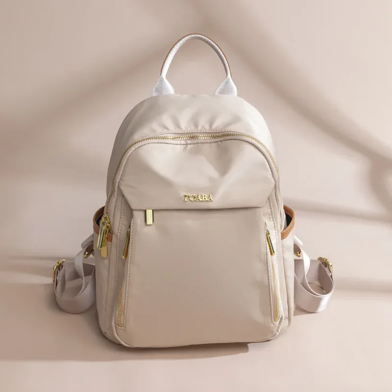 Sac à dos en tissu Oxford pour femme, léger, imperméable, sac de voyage tendance, grande capacité, sac à bandoulière transfrontalier, Nouveauté 2026