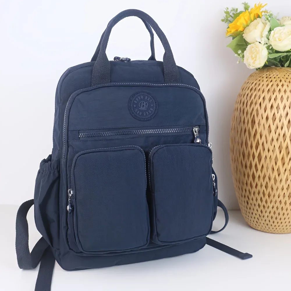 sac à dos d'école léger de grande capacité, sac de voyage multi-poches, matériau en nylon résistant à l'usure, bretelles confortables.